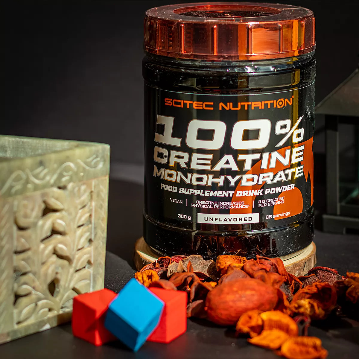 SCITEC Nutrition 100% Creatine Monohydrate supplement in container, promoting strength and performance boost.